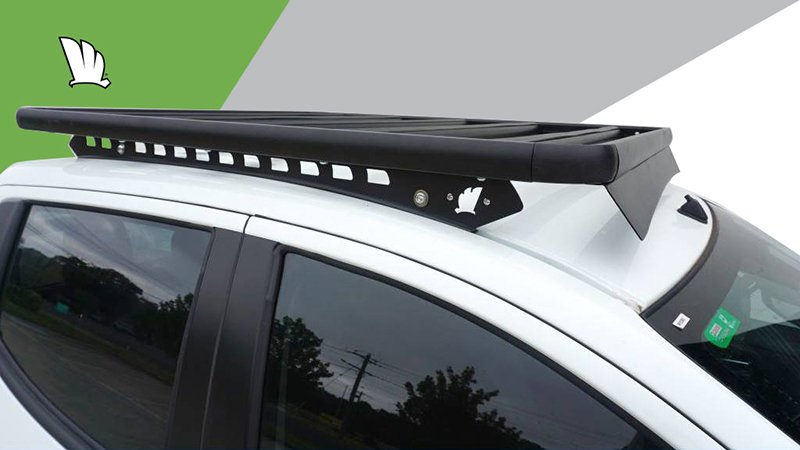 Close up image of the cabin of the Mitsubishi MQ Triton dual cab with a Wedgetail roof rack installed showing the one piece mounting rail and the wind deflector.