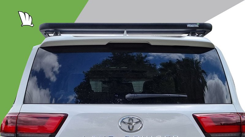 Rear view of Wedgetail roof rack installed on Toyota LandCruiser 300 Series showing the low height of the rack and the positioning of the rack in relation to the rear aerial.