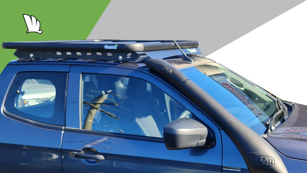 Image of front of roof with a Wedgetail rack installed showing wind deflector and one piece mounting rails and the platform roof rack installed on the mounting rail.