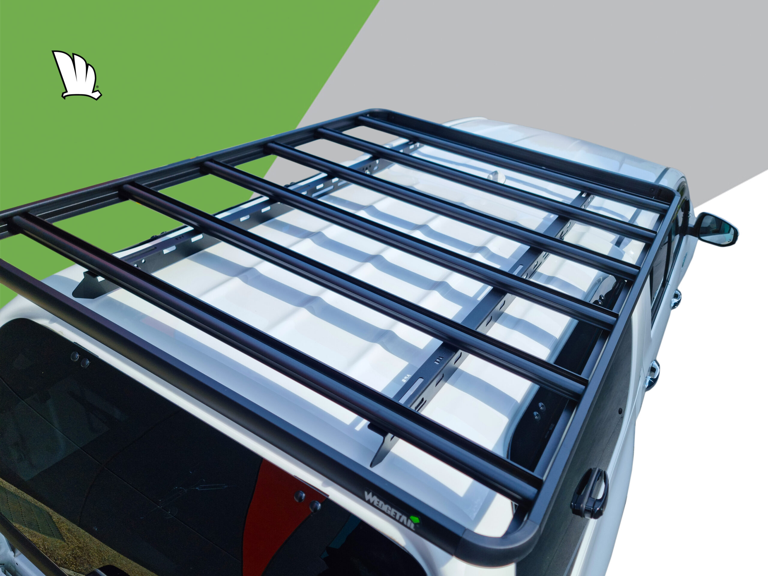 Front view of the Toyota HiLux 2020 Dual Cab with Wedgetail roof rack installed showing the platform rack with a wind deflector installed and the one piece mounting rails fixed in two places to lugs fitted to the roof sub-structure.
