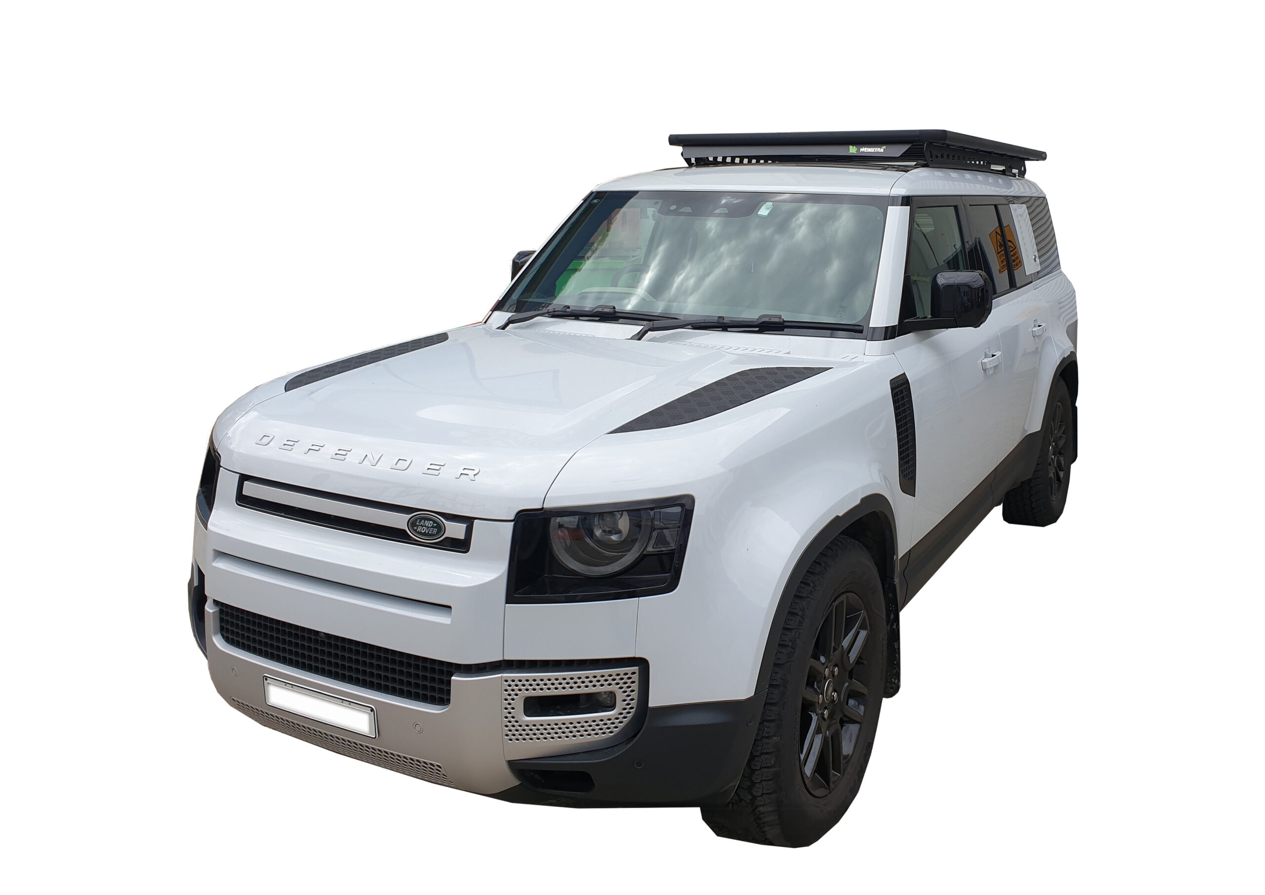 Land Rover Defender 130 fitted with a Wedgetail platform roof rack. Hero image.