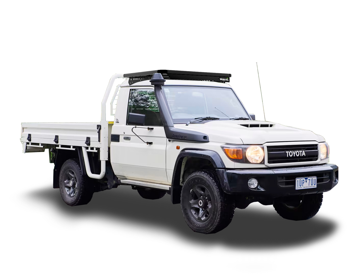 Hero image from front corner of a Toyota LandCruiser 79 Series dual cab with a Wedgetail roof rack installed.