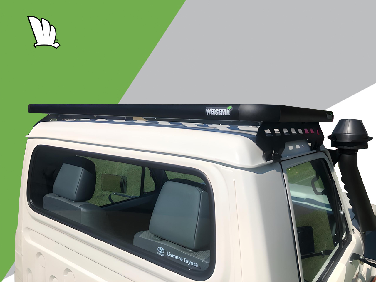 High view of the cabin of a Toyota LandCruiser 79 Series dual cab with a Wedgetail roof rack installed on the cabin showing clearly the five cross bars used to make it super strong and the one piece mounting rails supporting the roof rack platform.